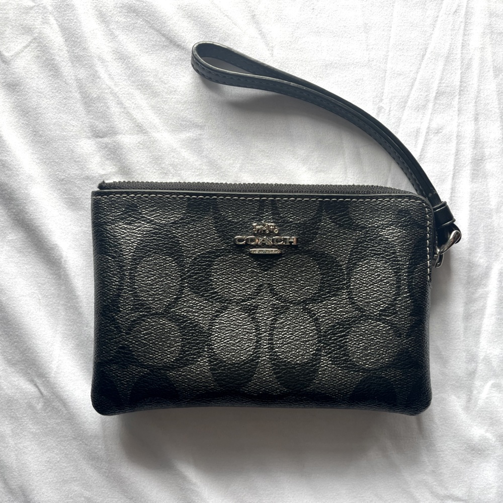 COACH CORNER ZIP WRISTLET IN SIGNATURE CANVAS